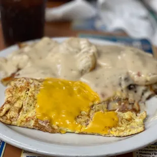 I dipped right in before snapping one! But this is the famous biscuits n gravy with ham n cheese omelette! BOMB