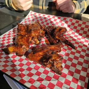 Wings, brisket, bologna,  sausage,  mac and cheese, black eyed peas