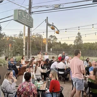 a large group of people sitting at tables