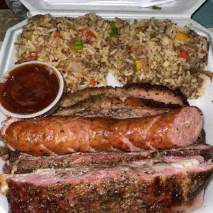 3 meat 2 sides  Ribs , sausage,brisket  Dirty rice