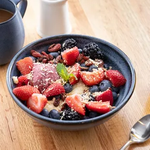 a bowl of fruit and yogurt
