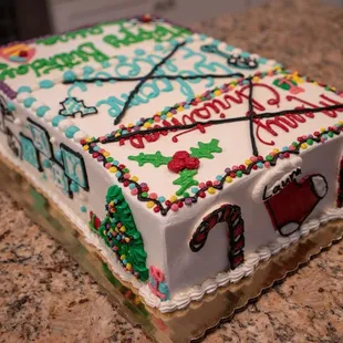 Custom triple event sheet cake with candy canes, Christmas tree, and baby blocks.