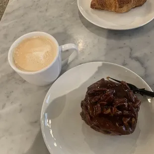 a pastry and a cup of coffee