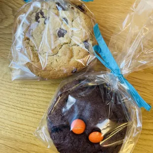 Chocolate chip cookies &amp; chocolate Reese&apos;s Pieces cookies (sold in packs of 2, 2 packs for $6 at the time of this writing)