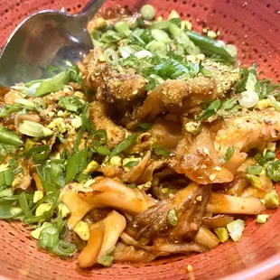 Roasted Mushrooms with calabrian chili agrodolce, pistachio, scallion