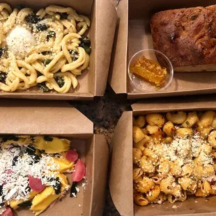 four boxes of pasta and meat