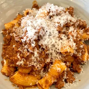 a pasta dish with meat and cheese