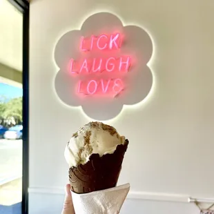 Scoop of tiramisu in a dark chocolate cone