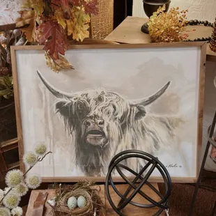 a cow with horns and eggs