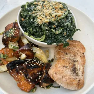 Salmon entree with sweet potato and kale salad sides