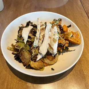 Protein (chicken) and two sides (Yuzu Brussels Sprouts and Red Chile Glazed Sweet Potato)