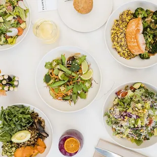 a variety of salads and drinks