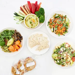 a variety of food items arranged in a circle