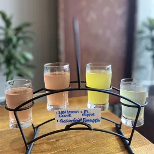 Kombucha Flight: Lavender Lemon Lime, Pink Passion Fruit, Mexican Hippie, and Pineappley Ever After
