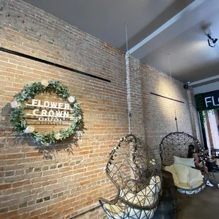 a brick wall with a wreath on it