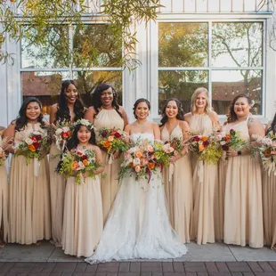 Love how the bouquets highlight the dressses!