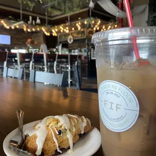 Blueberry Lemon Scone, Chai Tea, Colorful and Cozy Background with string lights and coffee