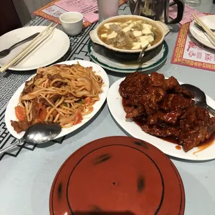 Clockwise from left:  Tomato Beef Chow Mein, Salted Fish with Chicken and Tofu clay pot and Peking Style Spare Ribs.