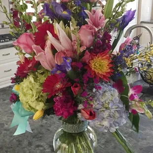 ABSOLUTELY GORGEOUS arraignment! I ordered earlier that morning and they were delivered to her doorstep that afternoon.