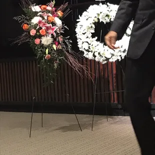 The flowers on the left were ordered on line and were the middle size priced arrangement.