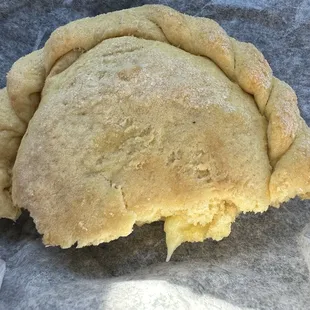Custard filled pastry with a crunchy crust around edges and a bit firmer in the middle.