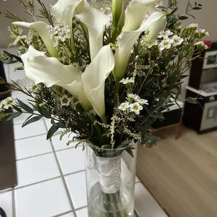 What we received - all mini Calla Lillies, placed in all different directions. Off center and very sparse.