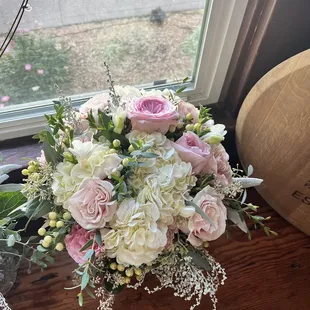 Wedding bouquet with garden roses and hydrangeas