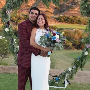 Wedding day was so beautiful and special!! Look at that beautiful flower arch! Also, I am a Flores who loves Flores