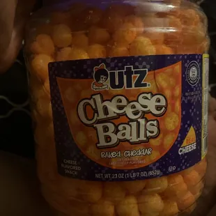I swear i bought it for the container&quot; she says as she ate the cheesy puff delightfully