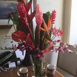 Fabulous Tropical arrangement from Carrie. For birthday. AND it lasted until we left 11 days later. 5* Stars. Mahalo Cherrie.