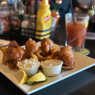 a plate of fried fish and chips