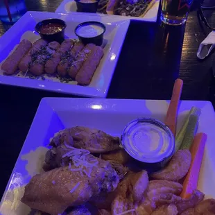Wings, mozzarella sticks, and carbs asada tacos