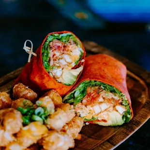 a plate of food and a glass of beer