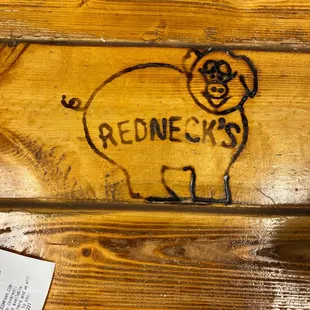 a pig on a bench