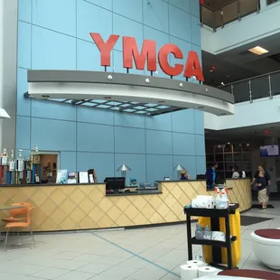 Welcome desk. Lots of natural light at the large entrance.