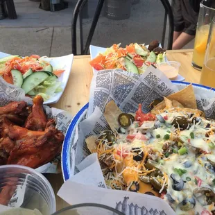 Nachos, wings, and side salads!