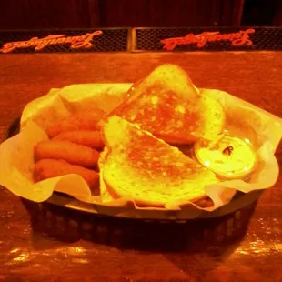 Ham, egg, and cheese breakfast sandwich with &quot;spud busters&quot;.