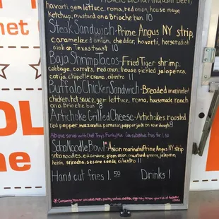 a menu on a food truck