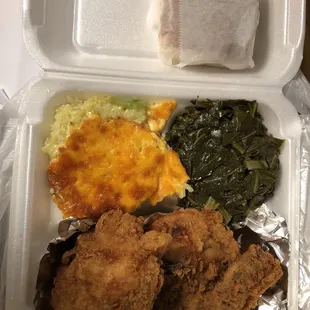 Fried chicken combo , thigh &amp; breast, collard greens, broccoli cheese rice. Total cost with tax, $7.92,  very fair givin the amount of food