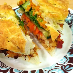 The Mutha Clucka Sandwich. Garlic-rosemary focaccia, roasted chicken, hummus and tons of veggies.