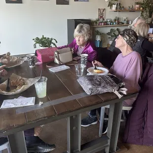 Sandwiches, drinks and huge table.