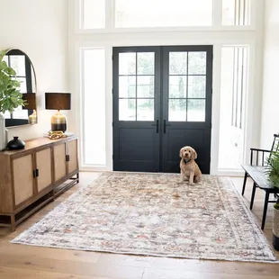 Four Hands console, mirror and bench, Loloi Rug in entry. Interior designer. Fluff Interior Design, Omaha, NE. Lincoln, NE.
