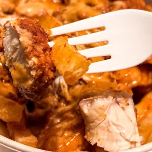 Fluffies Filled Fries 1/2 mac&amp;cheese. Half French fries + half macaroni &amp; cheese topped with fried chicken and sauce