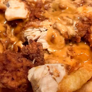 Fluffies Filled Fries. With 1/2 Mac. Hot chicken &amp; sauce over fries and macaroni and cheese