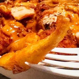 Fluffies Filled Fries. With 1/2 Mac. Hot chicken &amp; sauce over fries and macaroni and cheese