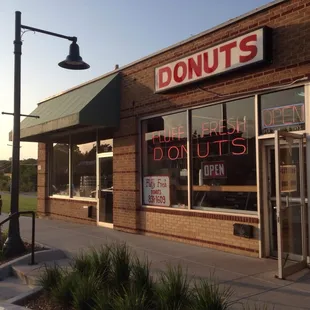 the outside of a donut shop