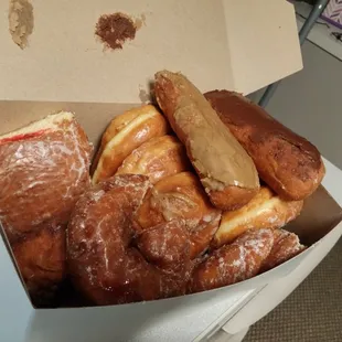A custom assorted dozen with a few donuts missing a slice already :).