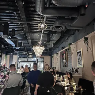 a group of people sitting at tables