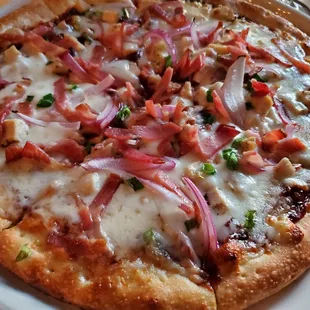 Funky chicken pizza with added prosciutto