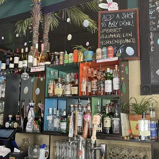 a variety of alcohols on the bar
